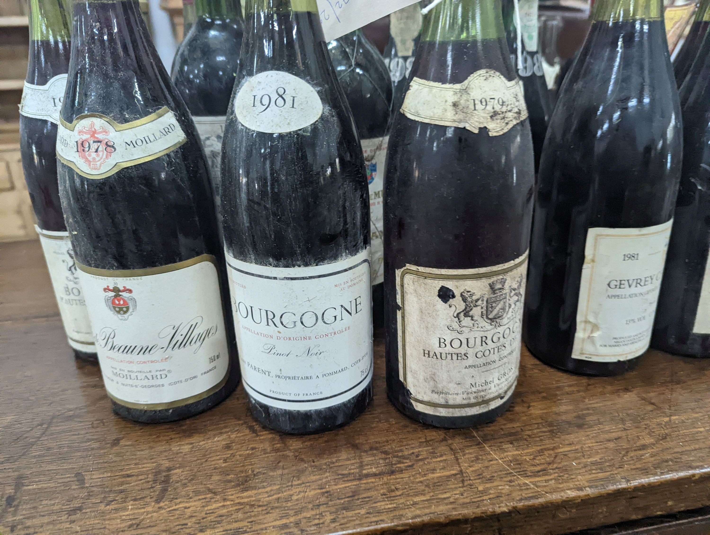 Twenty three bottles of assorted red wine, mainly French together with a bottle of Hungarian Tokaji